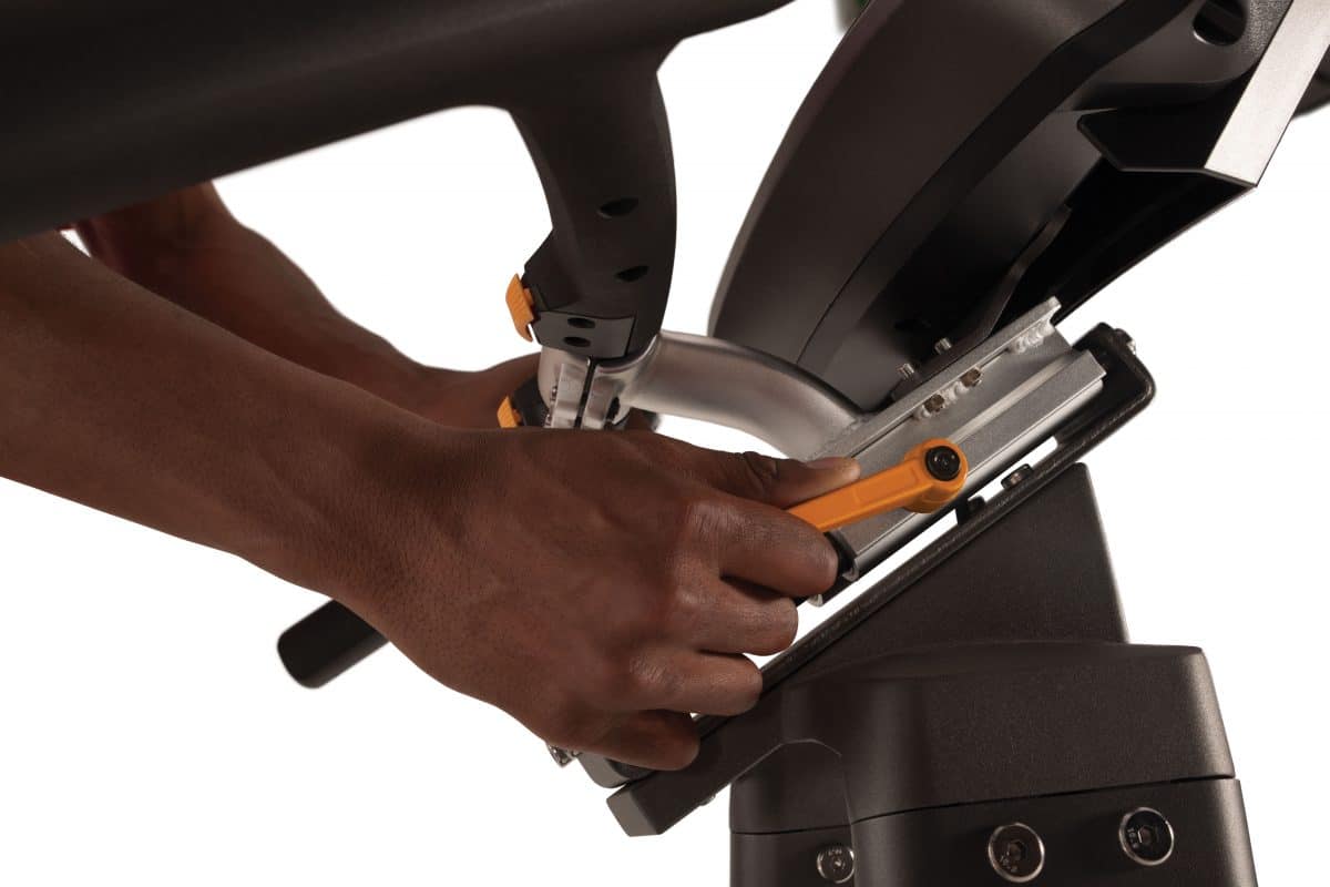 A person is working on a stationary bike.