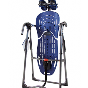An inversion table with a blue and black seat.
