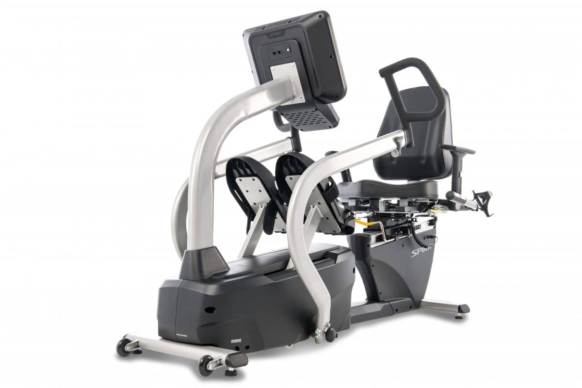 A stationary exercise bike with a seat and a monitor.