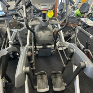 Elliptical exercise machines in a gym.